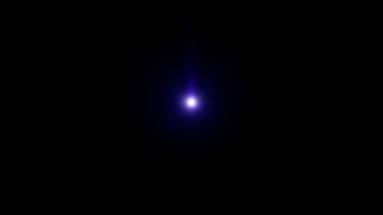 Feixe de luz passando por uma pequena abertura
